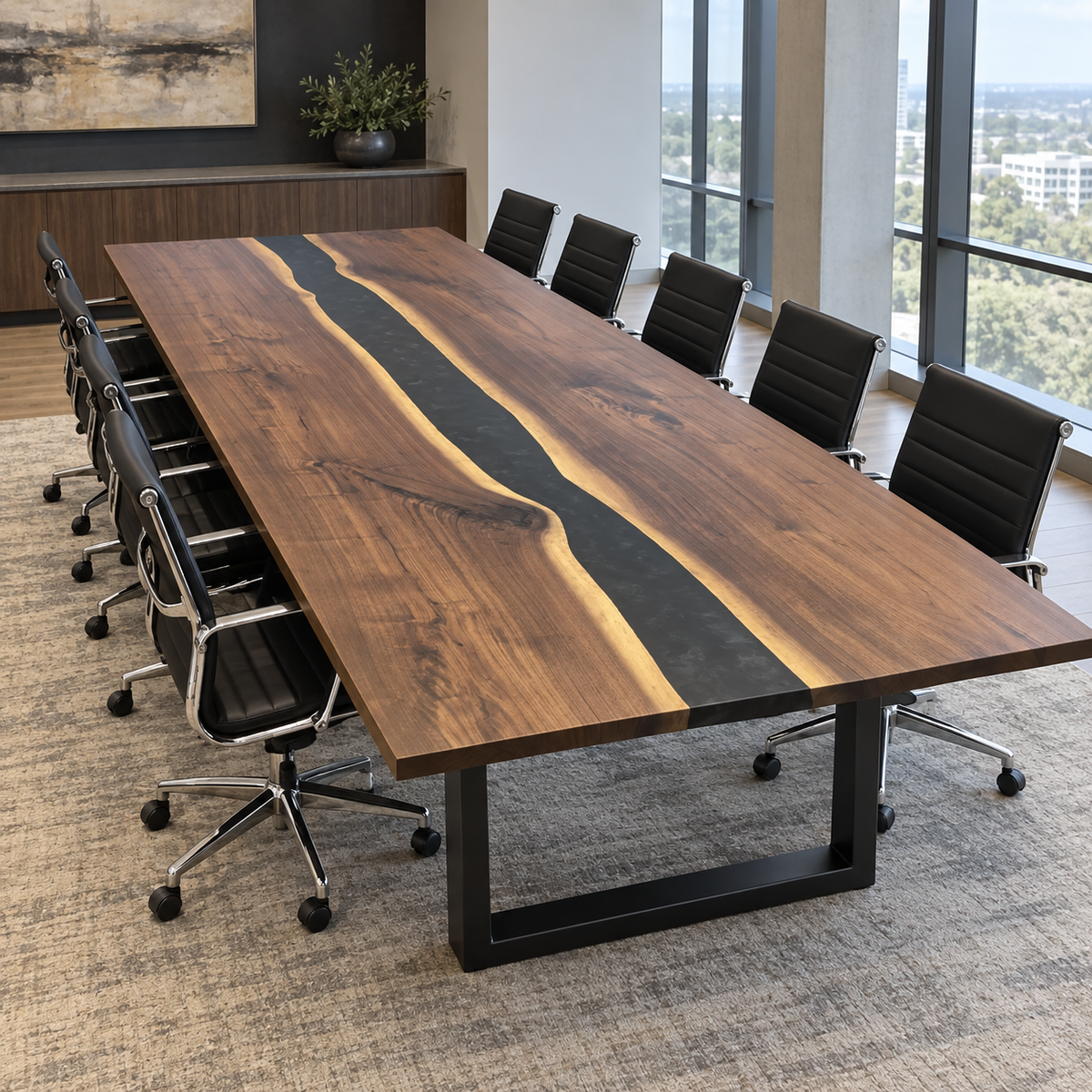 Angled view of a custom black walnut boardroom table featuring a flowing black epoxy river, natural wood grain, and sturdy black metal legs.